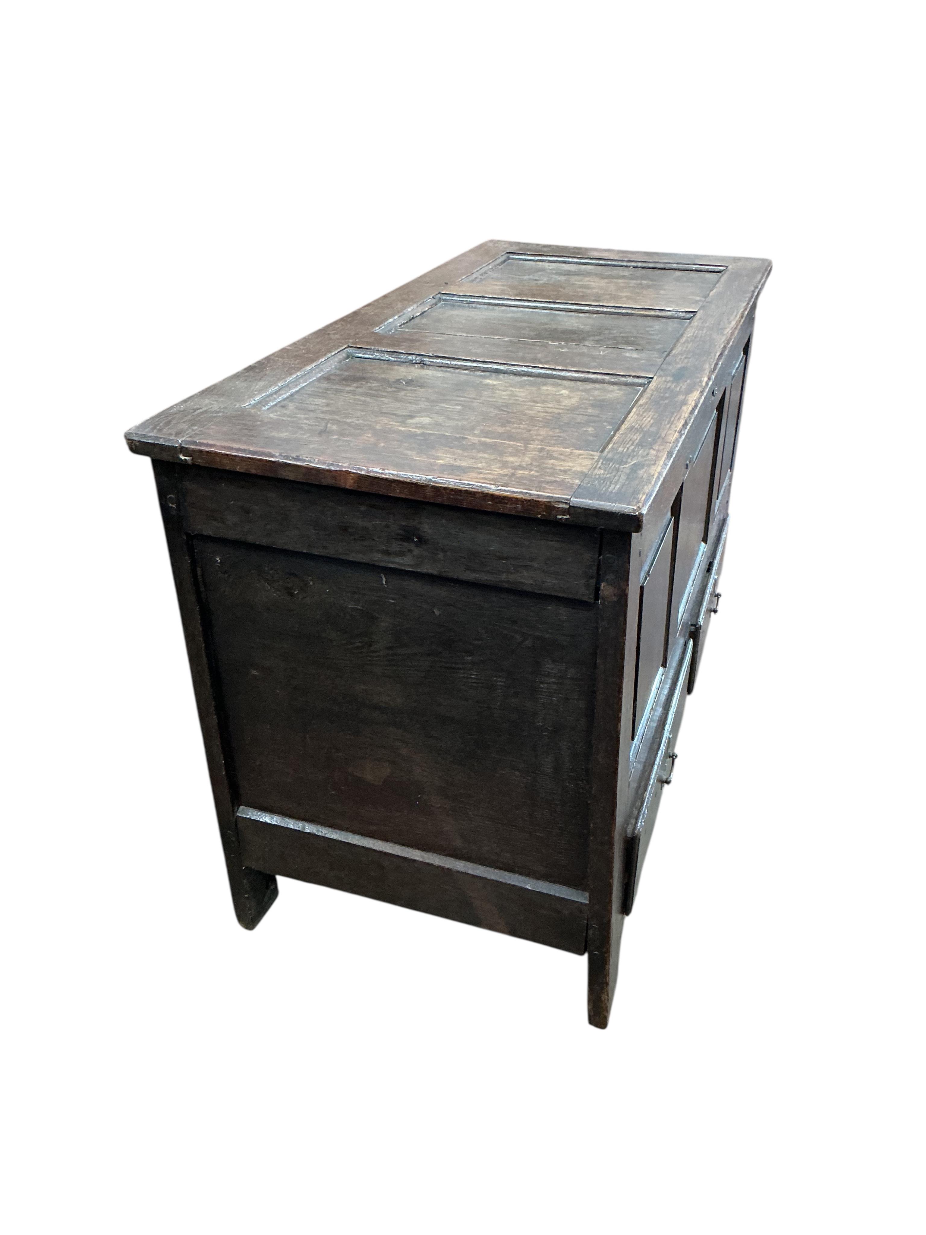 A mid 18th century oak mule chest, width 112cm, depth 51cm, height 67cm